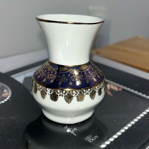Elegant White and Blue Vase with Gold Accents